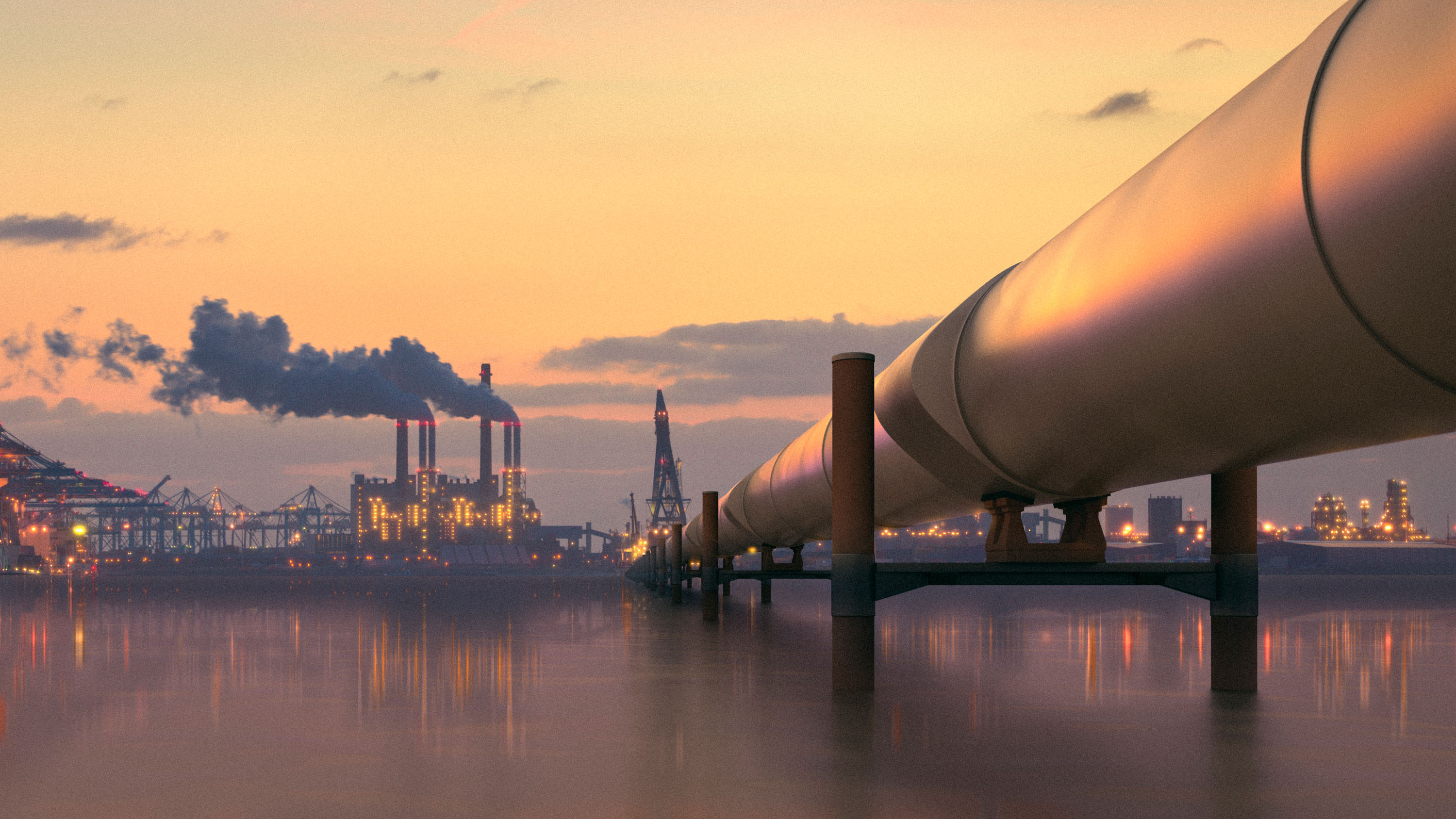 Oil pipeline in industrial district with factories at dusk