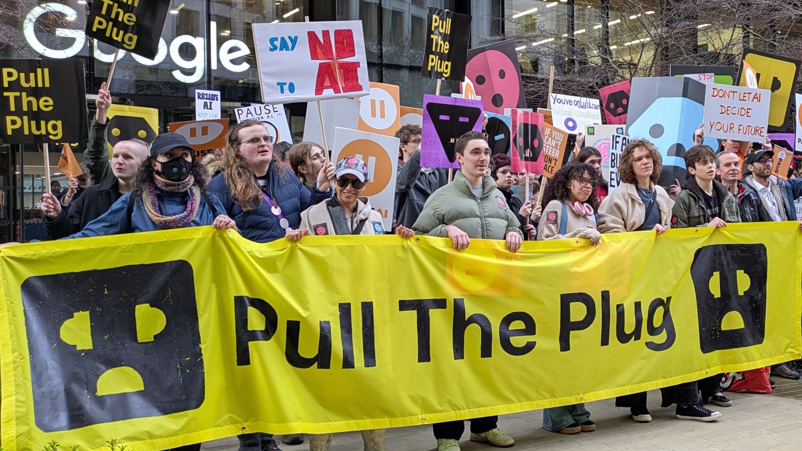 Protesters gather in London to march against AI